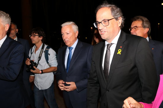 Catalan president Quim Torra (right) walks with Cecot president Antoni Abad at the event on October 23 2018 (by Andrea Zamorano)
